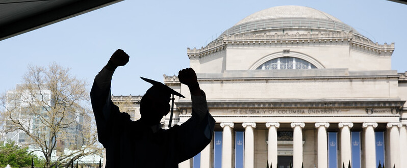 Graduate in Front of Low Library