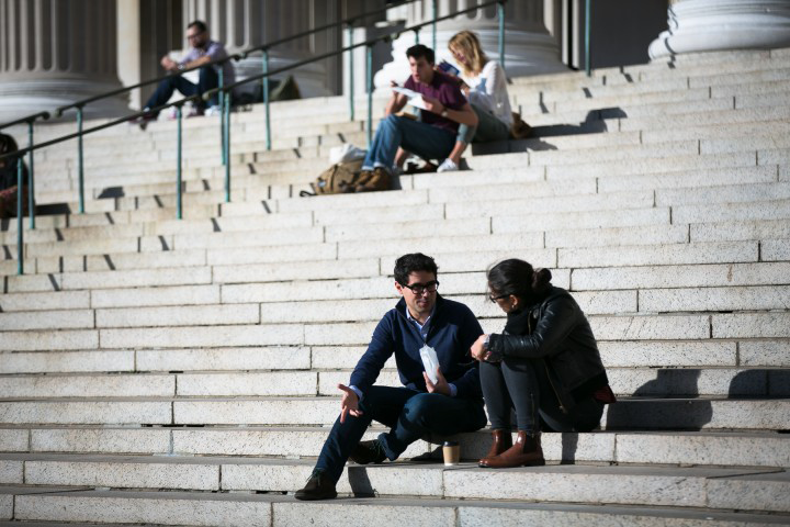 Two People Talking on the Steps