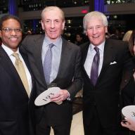 Community Impact honored University Trustee Michael B.Rothfeld ’69 (second from left) with the “Making a Difference Service Award” for his support of Community Impact’s programs throughout Upper Manhattan.