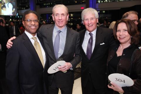Community Impact honored University Trustee Michael B.Rothfeld ’69 (second from left) with the “Making a Difference Service Award” for his support of Community Impact’s programs throughout Upper Manhattan.