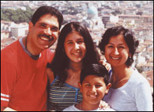 Fernando Ortiz with his wife and children