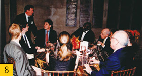 Quigley visits with College students and alumni during the dinner
