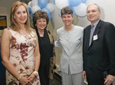 (left to right) Cheryl Milstein '82, Barnard President Judith Shapiro, Director of Athletics M. Dianne Murphy, and Phil Milstein '71