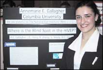 Annmarie Gallagher '03 with her poster in the Capitol