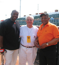 Dr. Richard J. Cohen '57 with Barry Bonds and Willie Mays