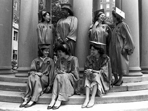 Members of the Class of 1987 gathered at the Van Amringe Memorial: (standing, left to right) Kokoro Kawashima, Vania Leveille, Marya Pollack and Shelley Coleman; (seated, left to right) Ilaria Rebay, the salutatorian, Linda Mischel, the valedictorian, and Hannah Jones, class president.