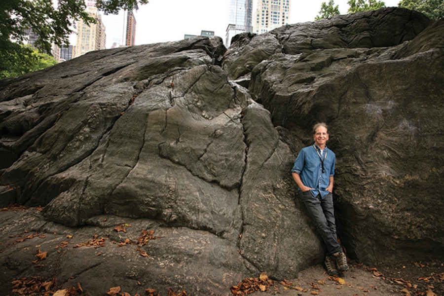 Professor Steven L. Goldstein CC’76, GSAS’86 poses near a large rock in Central Park