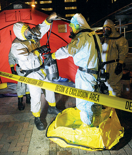 An ebola patient simulation and demonstration by the FDNY at Mt. Sinai Hospital. Photo: FDNY; courtesy Kevin Tyan CC’16