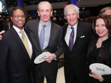 Left to right, George Van Amson CC ’74, University trustee emeritus; Michael B. Rothfeld CC ’69, JN ’71, SIPA ’71, BU ’71, University trustee and the evening’s honoree; Bill Campbell CC ’62, TC ’64, University Trustees chair; and Susan Feagin, special advisor to President Lee C. Bollinger, celebrate Rothfeld’s selection as the recipient of Community Impact’s 2013 “Making A Difference Service Award” at the event’s auction fundraiser. PHOTO: MICHAEL DAMES