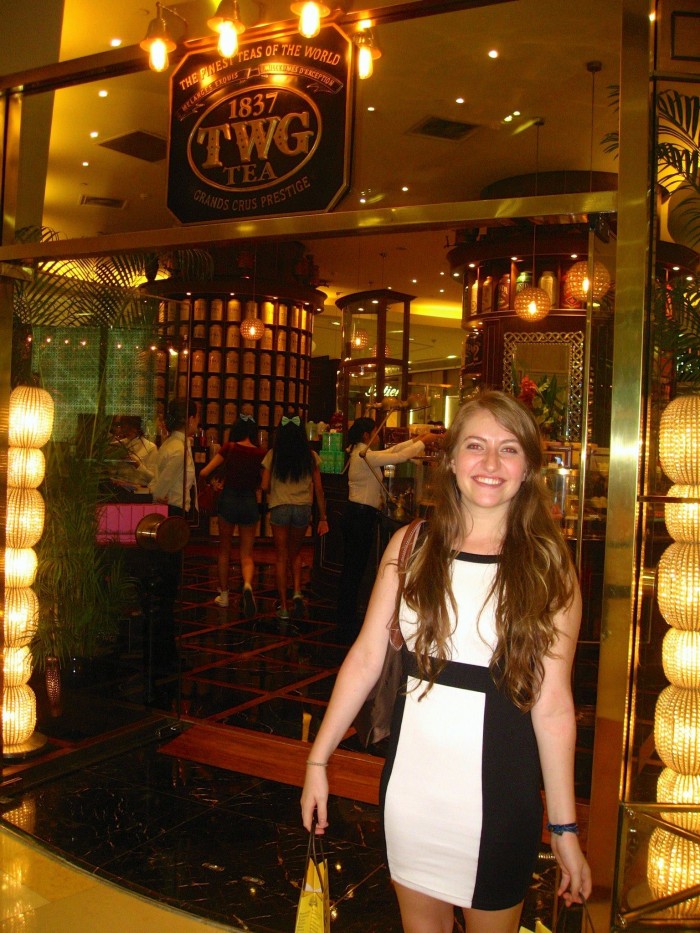Chloé Durkin CC’15 in front of TWG Tea, the company she interned for on CEO Singapore. Photo: Courtesy Chloé Durkin CC’15