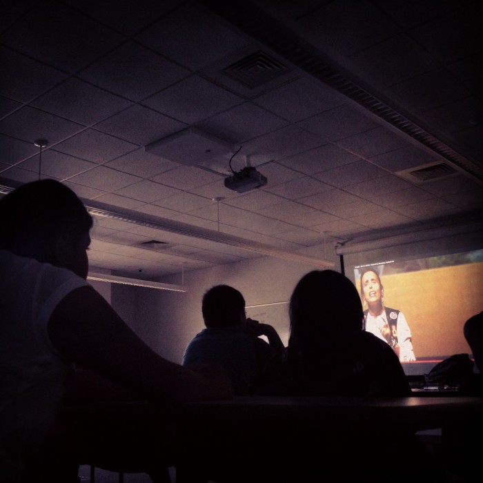 Students engage with a Winona LaDuke video on food sovereignty at Zuni Pueblo. Photo: Fantasia Painter CC’13