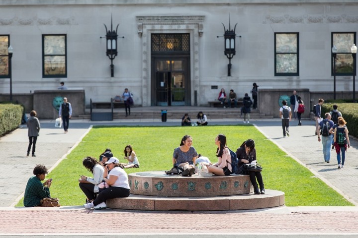 Students sitting on Sundial