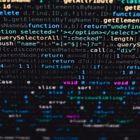 Code on computer screen, used to depict data.
