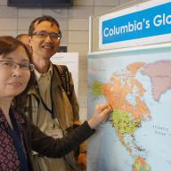 More than 1,000 friends and family members came to Columbia from hometowns across the globe to participate in Family Weekend and spend time with their favorite student. Here, parents place a pin in the location of their hometown on a world map after checking in for Family Weekend. Photo: Kat Cutler