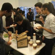 Residents of Shapiro Residence Hall hosted fellow students during a new building event, "Tasty Tower."  The program showcased the cultures of building residents through global foods and won Residential Life's "Diversity Program of the Year" award for residence hall programming. Photo: Darleny Cepin