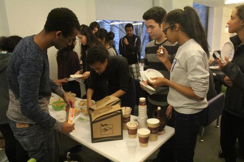 Residents of Shapiro Residence Hall hosted fellow students during a new building event, "Tasty Tower."  The program showcased the cultures of building residents through global foods and won Residential Life's "Diversity Program of the Year" award for residence hall programming. Photo: Darleny Cepin