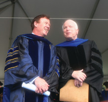 Quigley with Senator John McCain P’07 before his 2006 Class Day address. Photo: Eileen Barroso