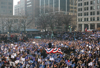 Even though he is just a tiny fraction of the picture, you immediately know where he is and that it is Obama. His posture at this rally in Wilmington, Del., that little lean, the dressing on the stage, Obama surrounded on all sides by supporters ... this is what I imagined a rally might look like during the time of Kennedy. 