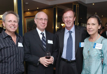 Alumni often gather at a classmate’s home for cocktails, and Dean Austin Quigley (second from right) just might drop by. Here, he and his wife, Patricia Denison, join two ’72 alumni last year at Conrad Lung ’72’s home. PHOTO: DAVID WENTWORTH