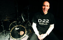 Charles Saliba ’00 at D-22, his popular rock and punk club in Beijing.  PHOTO: D-22