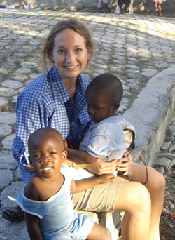 Sallie Wilson ’11 with two Haitian orphans at the King’s Hospital complex in Port-au-Prince before the earthquake. PHOTO: Hadley Wilson