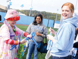 Although the Lions came up short on the football field against Dartmouth at Homecoming last year, alumni had fun under the Big Tent and at the Carnival. Photos: Eileen Barroso