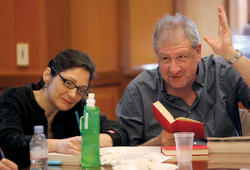 Margo Rosen '11 GSAS, a Core lecturer, compares notes with Richard Sacks, an adjunct associate professor of English and comparative literature and one of the a corps of mainstays who have taught Lit Hum for decades. Photo: Bruce Gilbert