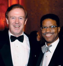 Quigley with University Trustee George Van Amson ’74.PHOTO: Eileen Barroso