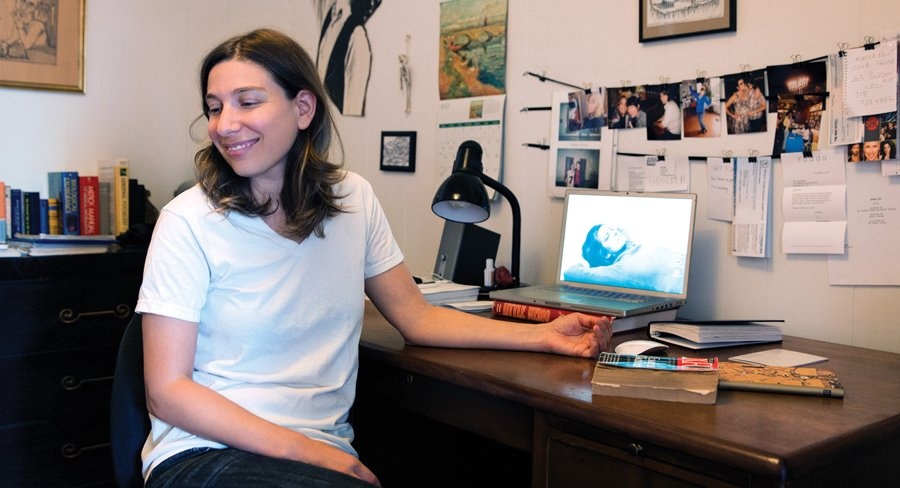 Ariel Schrag '03 smiling in a white T shirt