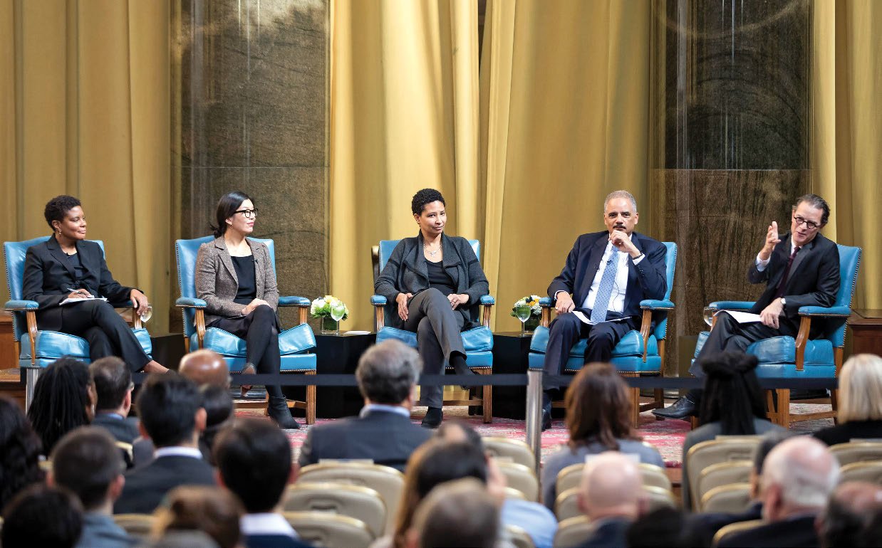 Photo of discussion panel at the launch event for the Holder Initiative