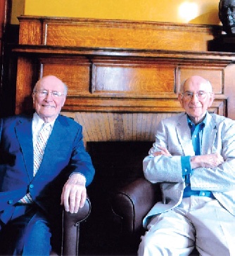 Two men in blue suits