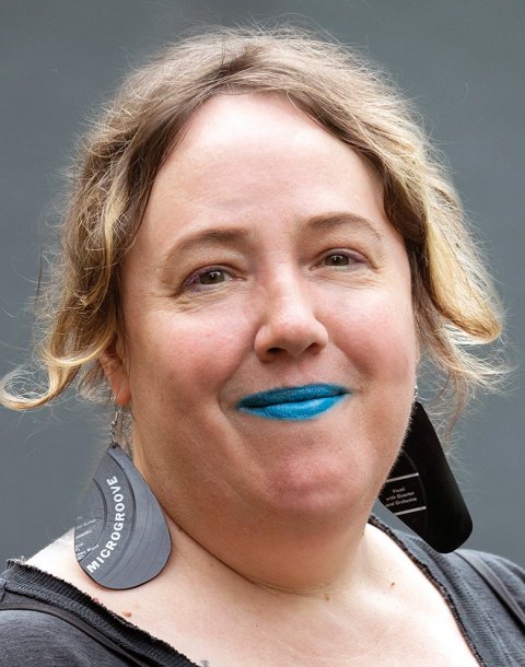 a woman with blue lipstick