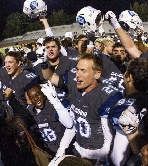 A football team celebrating