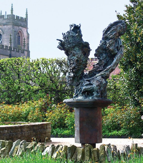 A large sculpture in a garden