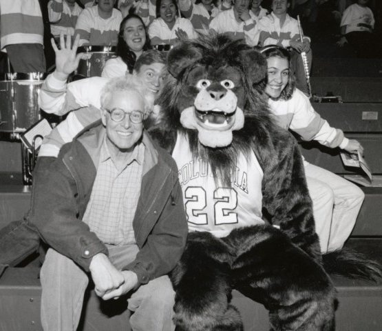 Robert Berne _60, BUS_62 with Lion mascot