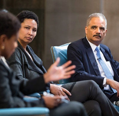 Photo of Eric Holder and other event panelists