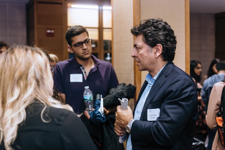 Photo of Jaime Prieto ’83, of Ogilvy & Mather, talking with students at the Odyssey Mentoring Program kickoff.