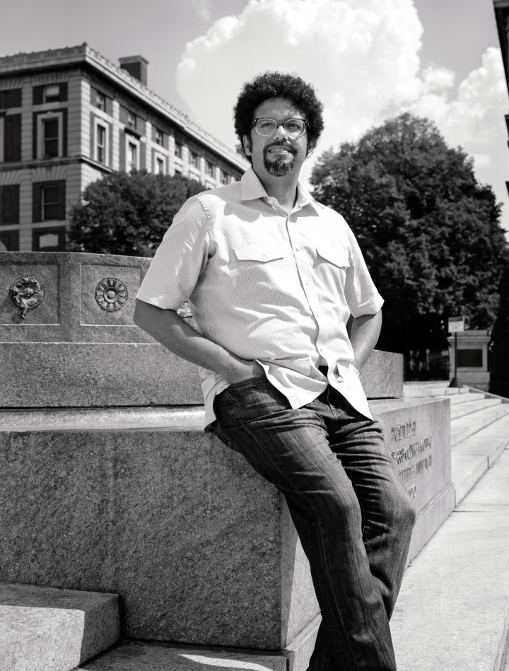 a man wearing glasses at the sundial