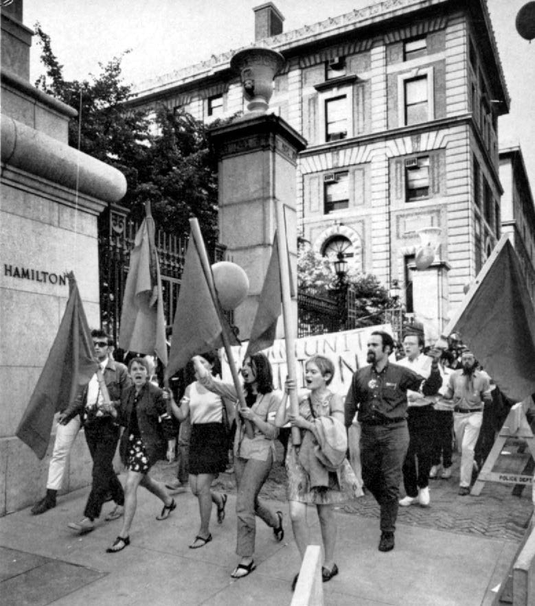 “We women do continue to march,” says Josie Duke Brown BC’69 (far left), leading a community action on Amsterdam Avenue.