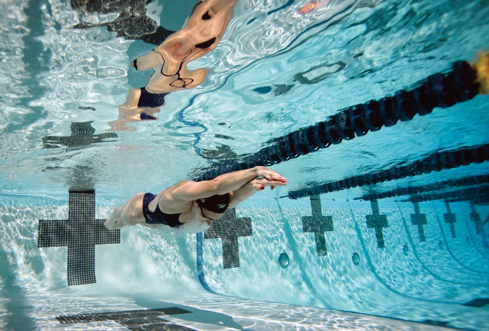 Katie Meili ’13 swimming