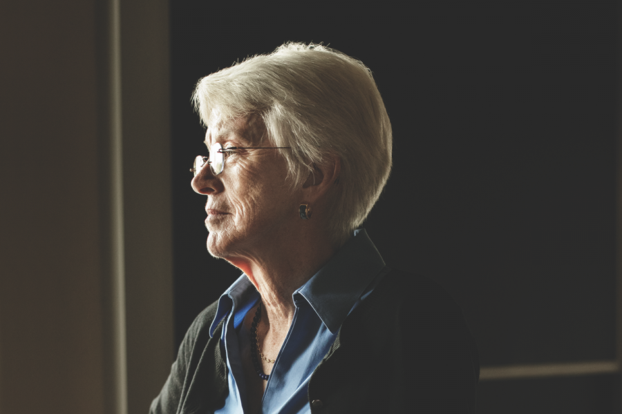A woman gazing to the viewer's left
