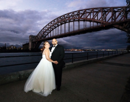 two people in front a bridge