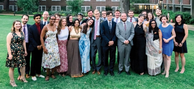 a group of people on a lawn