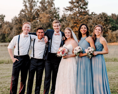 Taylor Willis (née Troutt) ’18 and Titus Willis ’18, with members of their wedding party.