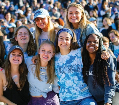 Several women smiling at the camera at Columbia University's 75 Homecoming.