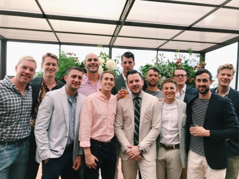 Photo of men at a wedding party