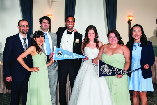 wedding party with Columbia banners