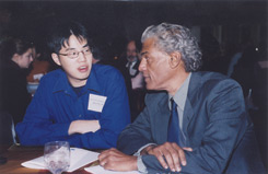 Joe Brown ’66 chats with Albert Wu ’05, one of the recipients of the Eric V. Smith scholarships. 