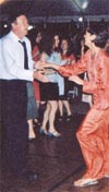 Dean Quigley dances with wife, Patricia Denison