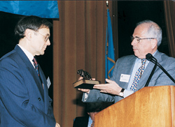 Gerald Sherwin '55 presents Satow with award.
